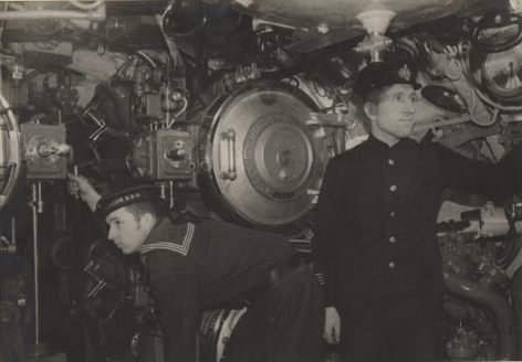 Torpedo gunners on board a submarine